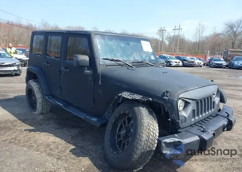 2010 Jeep Wrangler Unlimited Sport z USA, uszkodzony, nr VIN 1J4HB3H14AL106926